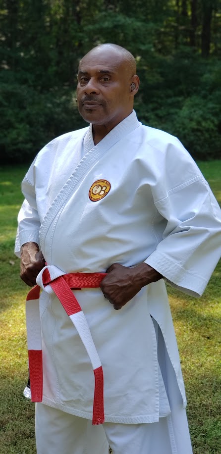 Sensei Herman T. White Sr. in traditional dobok, ready stance